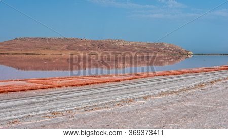 Brine And Salt Of A Pink Lake Koyash Colored By Microalgae Dunaliella Salina, Famous For Its Antioxi