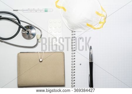 Medical Masks With Elastic Band, Thermometer, Medicine And Stethoscope, Isolated On White Background