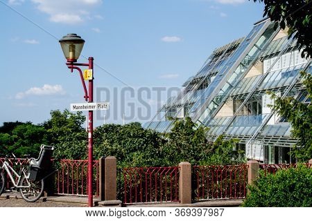 Riesa/germany - July 23/2018: Photo Of Cityscape With Houses, Asphalt Road And Trees On A Sunny Day