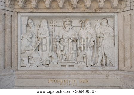 Budapest, Hungary - Feb 9, 2020: Relif On Limesonte Under Bronze King Stephan Statue
