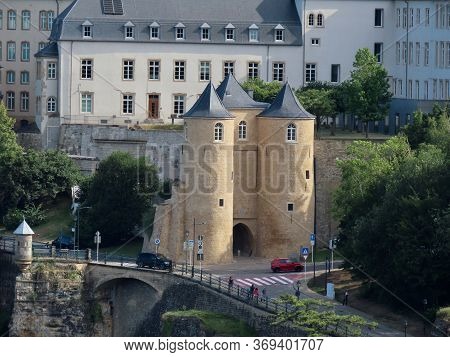 Luxembourg, Luxembourg - July 10, 2019. Three Towers Medieval Fortification Gate And Small Spanish T