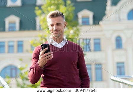 Modern Lifestyle. Modern Man Use Smartphone Urban Outdoor. Modern Day Device. Mobile Internet Access
