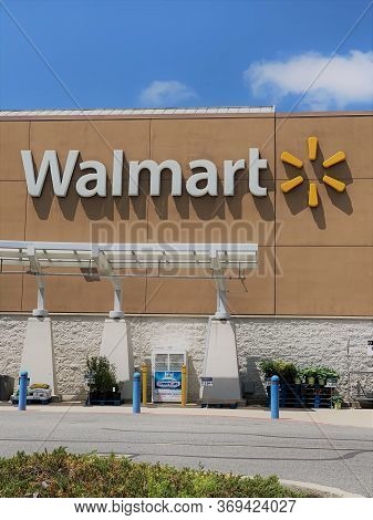 May 25, 2020 - Kennett Square, Pennsylvania. Walmart Storefront. A Walmart Sign And Logo Seen From T