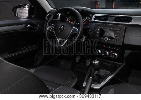 Novosibirsk/ Russia - May 25, 2020: Renault Arkana, Dark Car Interior - Steering Wheel, Shift Lever 