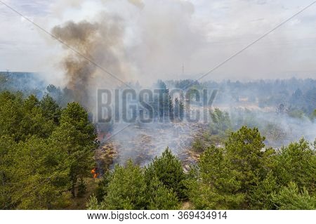 Aerial Drone View Of A Wildfire In Forested Area.