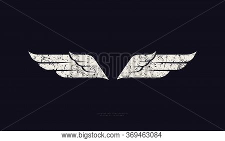 Stock Vector Wings Silhouette With Vintage Texture. For Logo, Emblem And T-shirt Design