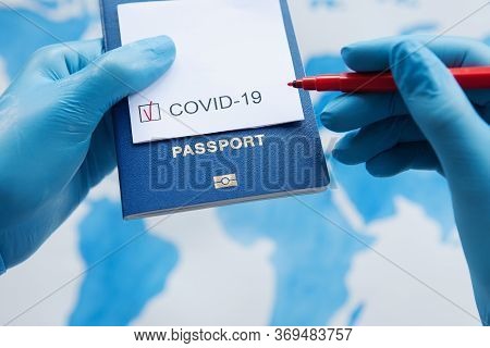 Immunity Passport, Risk-free Certificate Concept. Hands In Medical Gloves Hold Red Pen, Passport Wit