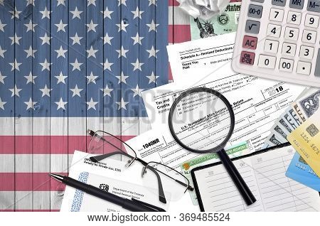Irs Form 1040nr Nonresident Alien Income Tax Return Lies On Flat Lay Office Table And Ready To Fill.