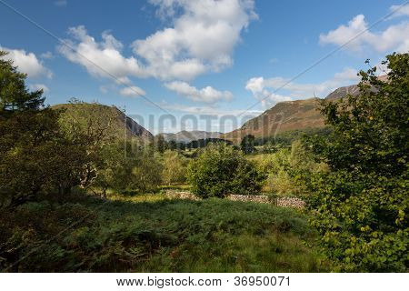 View Over Buttermere Village To Distant Hills