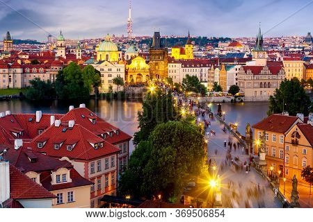 Aerial View Of Charles Bridge, Old Town And Zizkov Tv Tower In Prague, Czech Republic During Sunset 