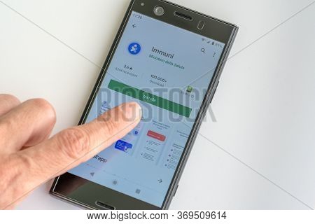 Installing Italian Immuni Tracking Application On Smartphone Against Coronavirus Pandemic.