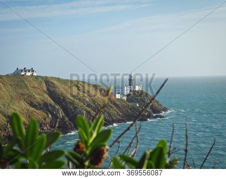 Baily Lighthouse In Ireland Near Dublin, Peninsula Sea