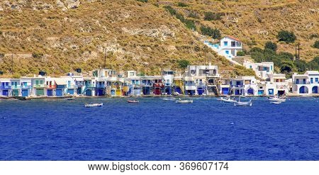 Panoramic Of Traditional Fisherman Village Of Klima Seen From The Sea, Milos Island, Cyclades, Greec