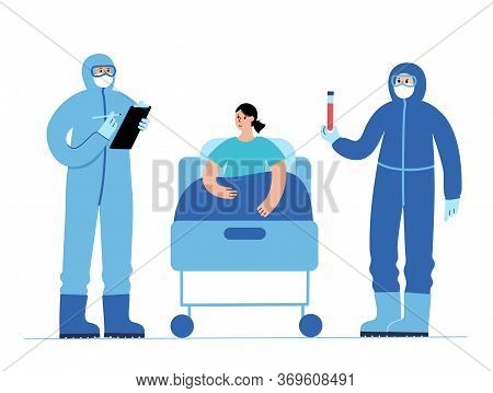 Doctor Virologist, Epidemiologist In Protective Suits Take Care About Woman Patient In The Ward In B