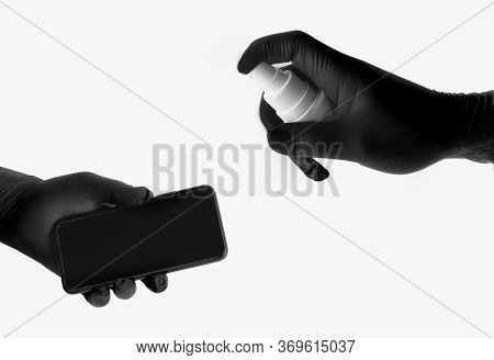 Hands In Black Gloves Spray Spray Disinfect The Phone