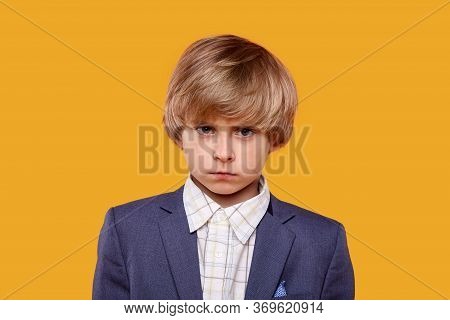 The Dear Offended Boy Lowered His Head And Puffed Out Cheeks