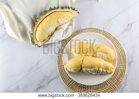 Close Up Durian The King Of Fruit In Thailand On White Plate.summer Tropical Thai Traditional Fruits