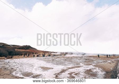 Geyser Valley In The Southwest Of Iceland. The Famous Tourist Attraction Geysir. Geothermal Zone Hau
