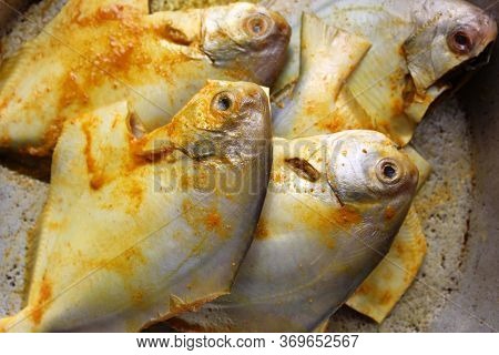 Cropped And Close View Of Sea Fish \'pomfret\'.  Fresh Raw Sea Fish Ready To Cook Display With Selec