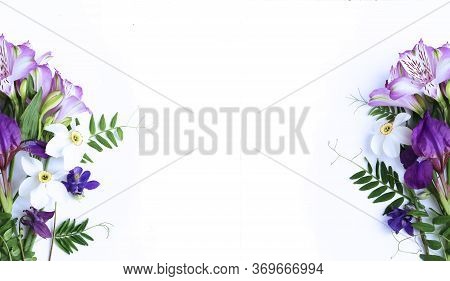 Spring Flower Arrangement - White Daffodils, Lilac Alstroemeria, Purple Irises On A White Background