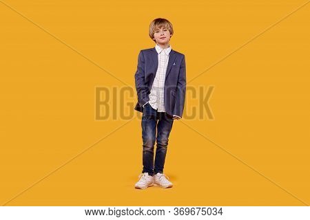 Beautiful Boy In Business Suit And White Shirt In Full Height