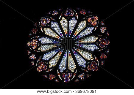 Wissembourg. France. - April 20, 2019: Beautiful Stained Glass On A Black Background In The Cathedra