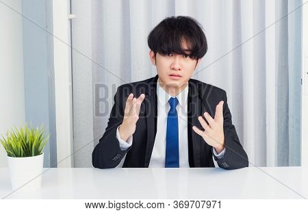Work From Home, Close Up Face Of Asian Young Businessman Video Conference Call Or Facetime He Lookin