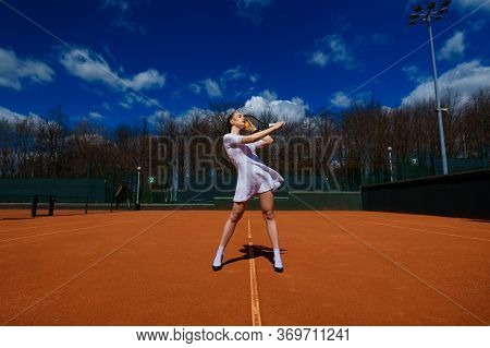 Happy Beautiful Sexy Girl Playing Tennis On The Court. Sport And Recreation, Leisure