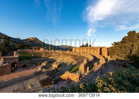 Ancient Greek And Roman Theater At Sunset In Taormina Town, Messina, Sicily Island, Italy (ii Centur