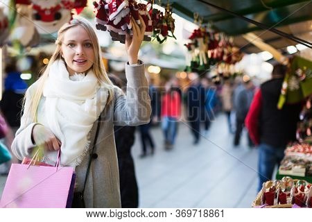 Happy Beauty Female Shopping At Festive Fair Before Xmas