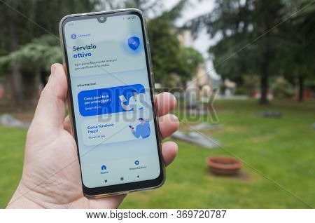 Carrara, Italy - June 04, 2020 - Man Check The Contact Tracer App Immuni, Developed For The Italian 
