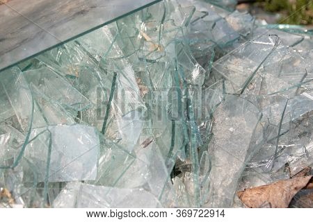 Pieces Broken Glass Background. Broken Glass On The Ground In The Street With Lots Of Broken Glass