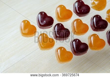 Homemade Gelatin Candies On A Beige Background. Jelly Candies With Blueberries And Orange. Treats Wi