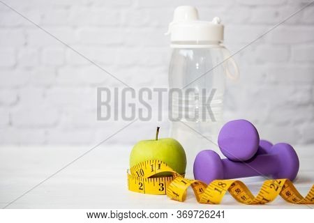 Diet Health Food And Lifestyle Health Concept. Sport Exercise Equipment Workout  and Gym Background 