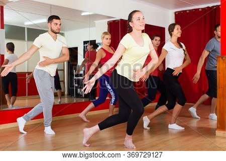 Couples Dancing Contemp In Studio Smiling And Having Fun