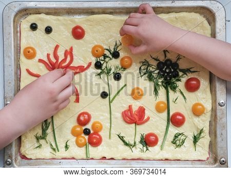 Focaccia Gardens Trend. Kids Making Focaccia Art Bread. Little Chef Concept, Social Media Trendy Foo
