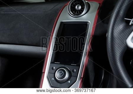 Infotainment System In A Sports Car Interior