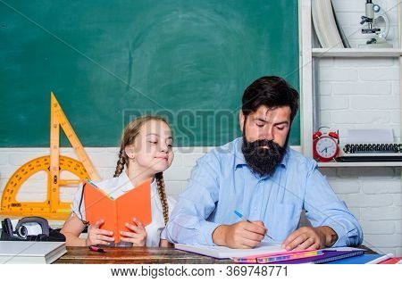 Lesson Is Finished. Man Bearded Pedagogue Study Together With Kid. Study Is Fun. School Teacher And 