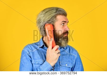 Bearded Hipster Man Phone Conversation. Successful Negotiations. Retro Phone. Marketing Automation. 