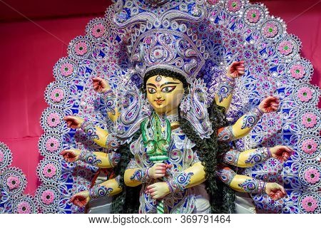 Goddess Durga Idol At Decorated Durga Puja Pandal, Shot At Colored Light, In Kolkata, West Bengal, I