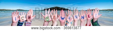 Children Hands Building Word Ich Gewinne Means I Am Winning, Ocean Background