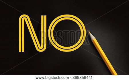 Pencil Writing Word No Over Black Background. Refuce Concept