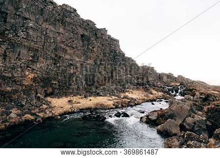 Mountain River From Ehsaraurfoss Falls, In Silfra Fault, Tingwedlir Valley.