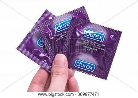 Kyiv, Ukraine - 22 May 2020: Three Durex Elite Condoms In Hand. Healthy And Safe Sex.