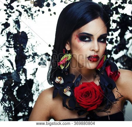 Pretty Brunette Woman With Rose Jewelry, Black And Red, Bright Make Up Kike A Vampire Closeup Red Li