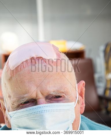 Elderly Man Wearing Face Mask As Coronavirus Protection,hampshire,united Kingdom.