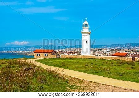 Ancient Ruins Of Kourion City Near Pathos And Limassol, Cyprus. Road To Lighthouse Under The Blue Sk