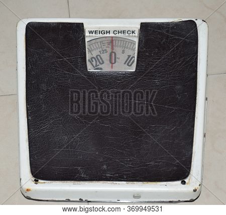 An Old Weighing Scale Or Machine. High Angle Shot