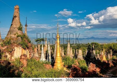 Ruins Of Ancient Stupas Of Shwe Indein Pagoda Over Blue Sky. Indein Village, Inle Lake, Shan State, 