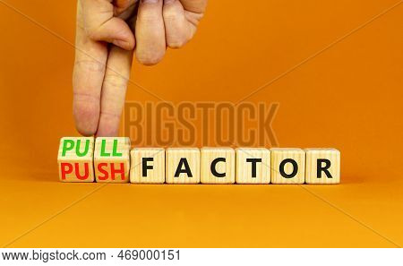Pull Or Push Factor Symbol. Concept Word Pull Factor And Push Factor On Wooden Cubes. Beautiful Oran